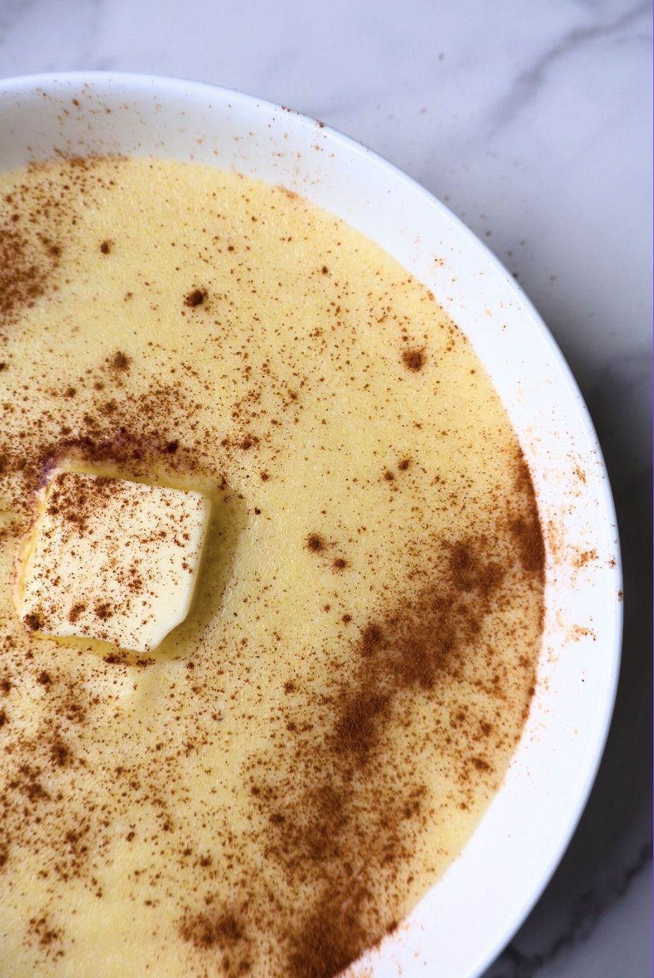 Creamy cinnamon cream of wheat with melted butter and cinnamon on top