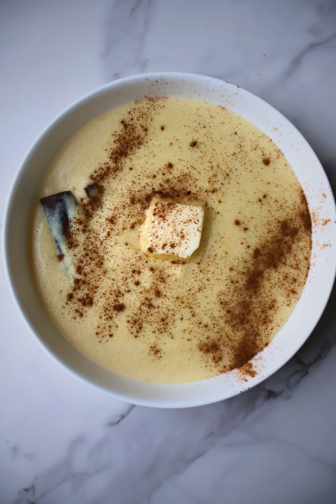 Creamy cinnamon cream of wheat made with whole milk, butter, and cinnamon in a white bowl