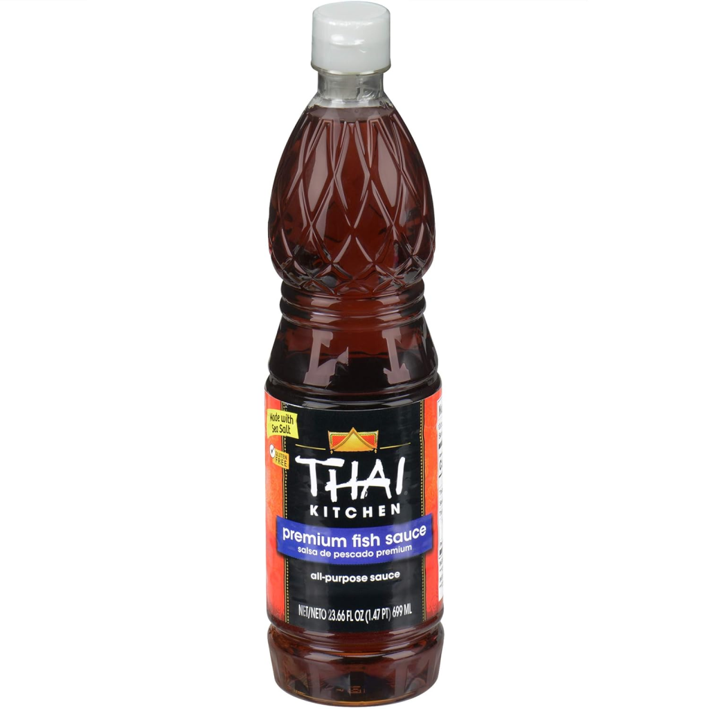Bottle of Thai Kitchen Premium Fish Sauce used as a savory seasoning for Thai curries, stir-fries, marinades, and dipping sauces.