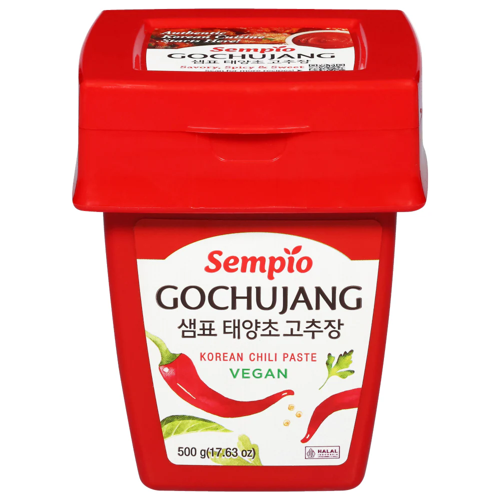 Container of Sempio Gochujang, a traditional Korean fermented red chili paste used in bibimbap, tteokbokki, stews, marinades, and sauces.