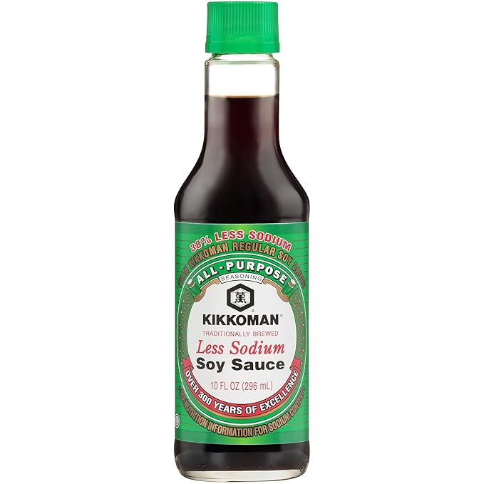 Bottle of Kikkoman Less Sodium Soy Sauce used as a pantry staple for Asian cooking, marinades, stir-fries, and dipping sauces.