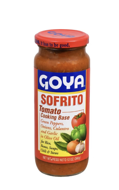 Jar of Goya Sofrito tomato cooking base, a key pantry ingredient used to build the flavor base of tomato paella