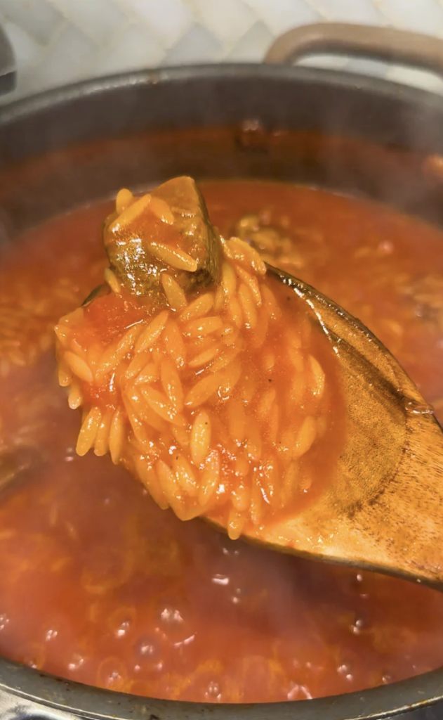Greek giouvetsi, beef and orzo baked in a rich tomato sauce, served in a pot