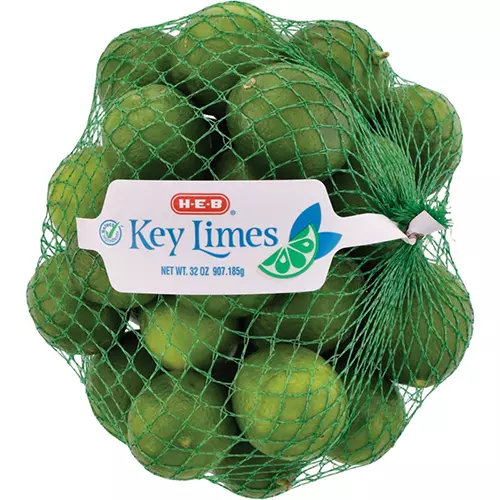 Bag of fresh key limes from H-E-B grocery store for making homemade key lime pie